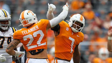 Sep 6, 2025; Knoxville, Tennessee, USA; Tennessee Volunteers linebacker Jeremiah Telander (22) and  linebacker Arion Carter (7) react to a play against the East Tennessee State Buccaneers during the second half at Neyland Stadium. Mandatory Credit: Randy Sartin-Imagn Images