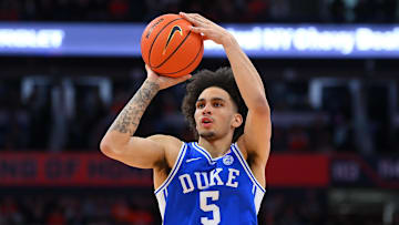 Feb 5, 2025; Syracuse, New York, USA; Duke Blue Devils guard Tyrese Proctor (5) shoots against the Syracuse Orange during the first half at the JMA Wireless Dome.