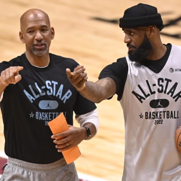 Feb 19, 2022; Cleveland, OH, USA; Team LeBron head coach Monty Williams, left, talks with Los Angeles Lakers forward LeBron James during the NBA All-Star practice at Wolstein Center. Mandatory Credit: David Richard-USA TODAY Sports
