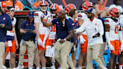 Nov 8, 2025; Miami Gardens, Florida, USA; Syracuse Orange head coach Fran Brown talks to officials in a game against the Miami Hurricanes during the first quarter at Hard Rock Stadium. Mandatory Credit: Jeff Romance-Imagn Images