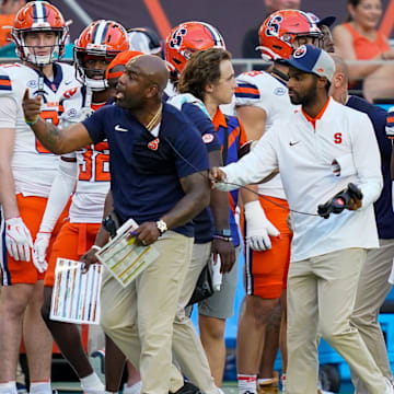 Nov 8, 2025; Miami Gardens, Florida, USA; Syracuse Orange head coach Fran Brown talks to officials in a game against the Miami Hurricanes during the first quarter at Hard Rock Stadium. Mandatory Credit: Jeff Romance-Imagn Images