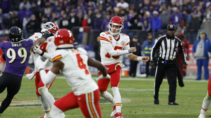 Jan 28, 2024; Baltimore, Maryland, USA; Kansas City Chiefs quarterback Patrick Mahomes (15) throws the ball to Chiefs wide receiver Rashee Rice (4) against the Baltimore Ravens during the second half in the AFC Championship football game at M&T Bank Stadium. Mandatory Credit: Geoff Burke-USA TODAY Sports