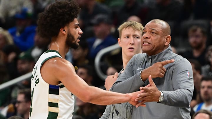 Nov 7, 2024; Milwaukee, Wisconsin, USA;  Milwaukee Bucks head coach Doc Rivers talks to forward Andre Jackson Jr. (44) in the second quarter against the Utah Jazz at Fiserv Forum. Mandatory Credit: Benny Sieu-Imagn Images