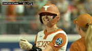 Texas Longhorns' Reese Atwood celebrates hitting a RBI single at the WCWS.
