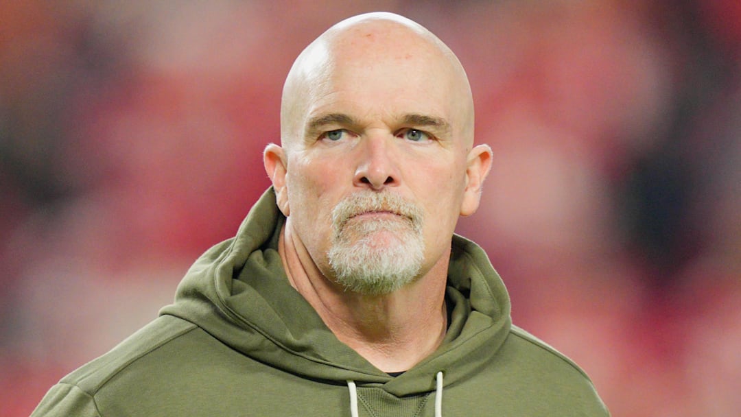 Oct 27, 2025; Kansas City, Missouri, USA; Washington Commanders head coach Dan Quinn looks on during warmups prior to the game against the Kansas City Chiefs at GEHA Field at Arrowhead Stadium. Mandatory Credit: Jay Biggerstaff-Imagn Images
