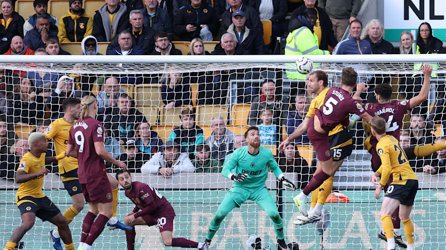 Bernardo Silva (centre, left) ducking.