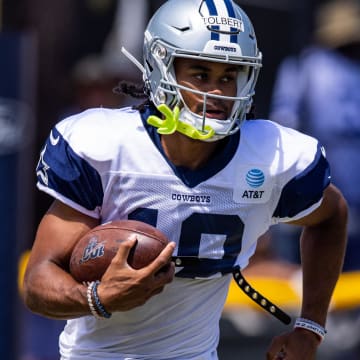 Dallas Cowboys wide receiver Jalen Tolbert (18) runs during training camp at River Ridge Playing Fields in Oxnard, California. 