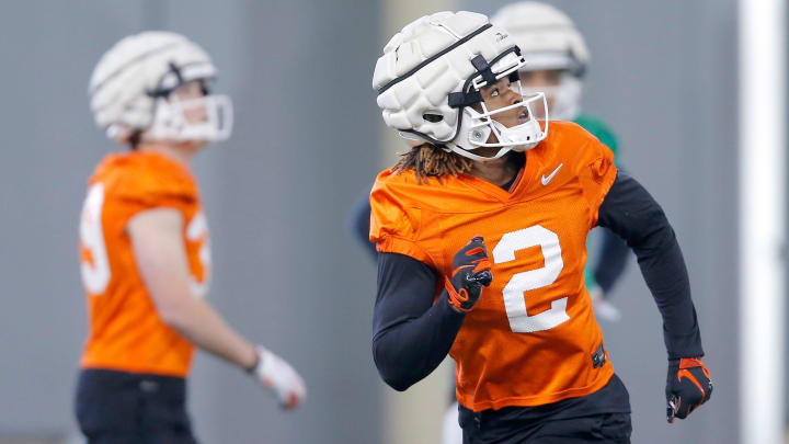 Oklahoma State wide receiver Talyn Shettron runs to catch a pass during the first day of spring football