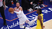New York Knicks guard Jalen Brunson (11) controls the ball against Indiana Pacers forward Aaron Nesmith (23) in the third quarter during game one of the eastern conference finals for the 2025 NBA Playoffs at Madison Square Garden.