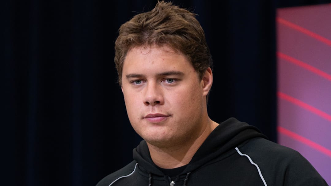 Feb 28, 2026; Indianapolis, IN, USA; Utah offensive lineman Caleb Lomu (OL33) speaks to members of the media during the NFL Combine at the Indiana Convention Center. Mandatory Credit: Jacob Musselman-Imagn Images