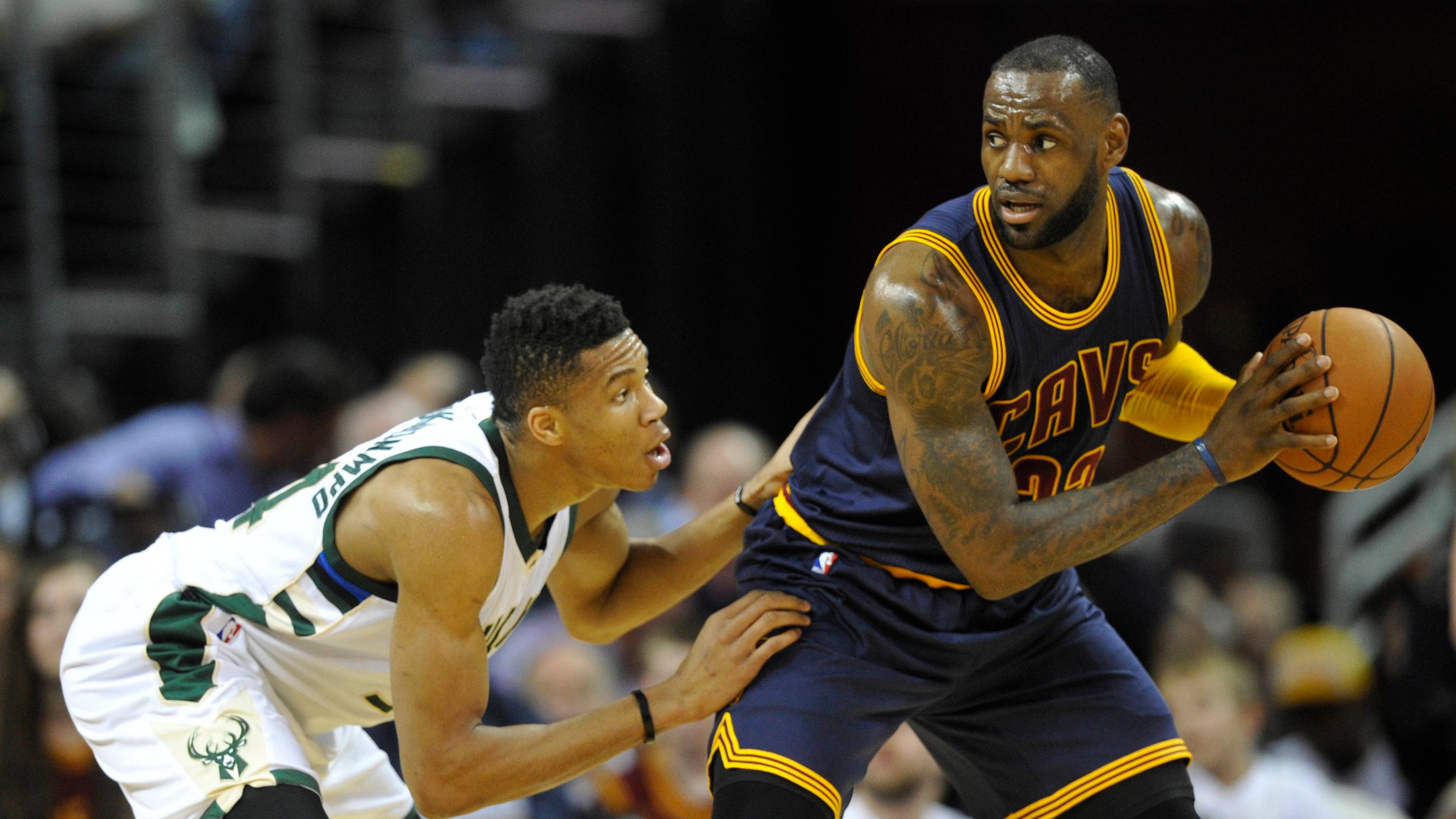 Mar 23, 2016; Cleveland, OH, USA; Milwaukee Bucks forward Giannis Antetokounmpo (34) defends Cleveland Cavaliers forward LeBron James (23) in the first quarter at Quicken Loans Arena. Mandatory Credit: David Richard-USA TODAY Sports