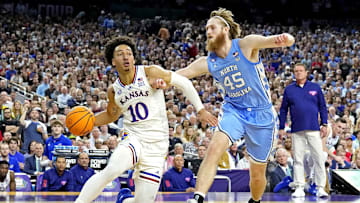 Apr 4, 2022; New Orleans, LA, USA; Kansas Jayhawks forward Jalen Wilson (10) drives to the basket against North Carolina Tar Heels forward Brady Manek (45) during the 2022 NCAA men's basketball tournament Final Four championship game at Caesars Superdome. Mandatory Credit: Robert Deutsch-Imagn Images
