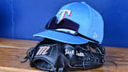 General view of a Texas Rangers hat, glove, and glasses prior to a spring training game against the Colorado Rockies at Salt River Fields at Talking Stick.