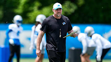 Detroit Lions head coach Dan Campbell watches practices during OTA at Meijer Performance Center in Allen Park on Friday, May 30, 2025.