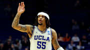 Mar 20, 2025; Lexington, KY, USA;  UCLA Bruins guard Skyy Clark (55) handles the ball during the second half against the Utah State Aggies in the first round of the NCAA Tournament at Rupp Arena. Mandatory Credit: Jordan Prather-Imagn Images