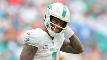Oct 12, 2025; Miami Gardens, Florida, USA; Miami Dolphins quarterback Tua Tagovailoa (1) reacts on the field against the Los Angeles Chargers during the third quarter at Hard Rock Stadium. Mandatory Credit: Sam Navarro-Imagn Images