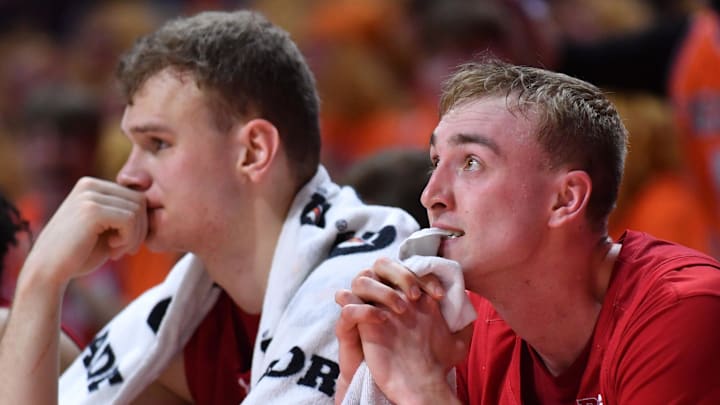 Feb 10, 2026; Champaign, Illinois, USA;  Wisconsin Badgers guard Andrew Rohde, right, and Aleksas Bieliauskas react during the second half against the Illinois Fighting Illini at State Farm Center. Mandatory Credit: Ron Johnson-Imagn Images