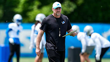 Detroit Lions head coach Dan Campbell watches practices during OTA at Meijer Performance Center in Allen Park on Friday, May 30, 2025.