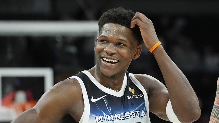 Jan 27, 2025; Minneapolis, Minnesota, USA; Minnesota Timberwolves guard Anthony Edwards (5) smiles at the Atlanta Hawks bench in the fourth quarter at Target Center. Mandatory Credit: Bruce Kluckhohn-Imagn Images