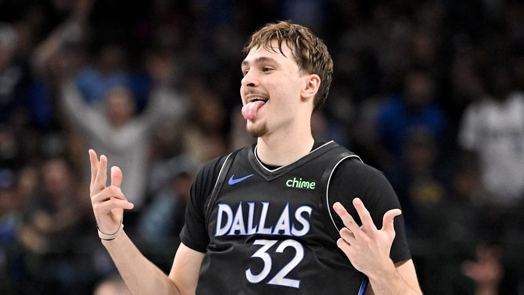 Dec 23, 2025; Dallas, Texas, USA; Dallas Mavericks forward Cooper Flagg (32) celebrates a three point basket during the second half against the Denver Nuggets at the American Airlines Center.