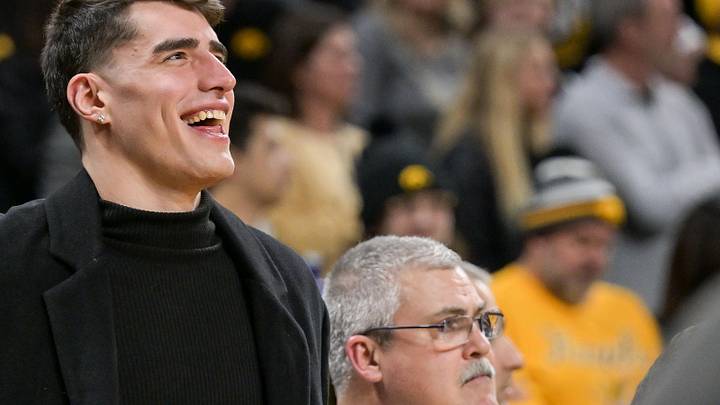 Feb 22, 2022; Iowa City, Iowa, USA; Former Iowa Hawkeyes player Luka Garza looks on before the game against the Michigan State Spartans at Carver-Hawkeye Arena. Garza would be honored during the game. Mandatory Credit: Jeffrey Becker-Imagn Images