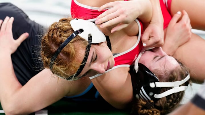 Ella Poalillo of High Point Regional earns back points during a victory last season. She enters the 2025-26 as our top-ranked wrestler in the 155-pound weight class.