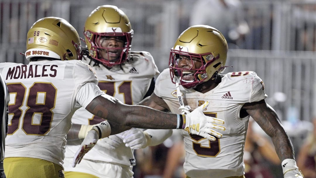 Sep 2, 2024; Tallahassee, Florida, USA; Boston College Eagles running back Kye Robichaux (5) celebrates a touchdown during the second half against the Florida State Seminoles at Doak S. Campbell Stadium. 