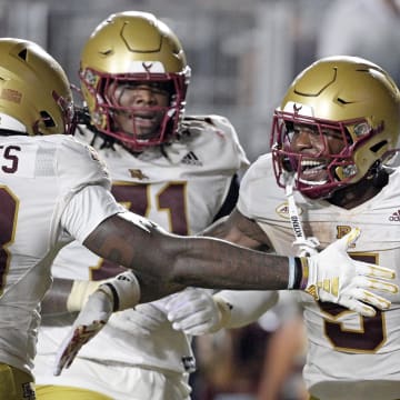 Sep 2, 2024; Tallahassee, Florida, USA; Boston College Eagles running back Kye Robichaux (5) celebrates a touchdown during the second half against the Florida State Seminoles at Doak S. Campbell Stadium. 