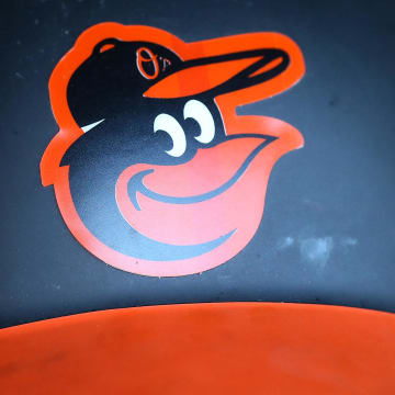 Jun 8, 2017; Washington, DC, USA; A Baltimore Orioles batting helmet rests in a cubby in the dugout against the Washington Nationals at Nationals Park. 