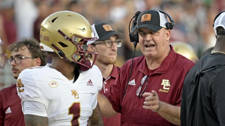 Sep 2, 2024; Tallahassee, Florida, USA; Boston College Eagles quarterback Thomas Castellanos (1) speaks with head coach Bill O'Brien before the game against the Florida State Seminoles at Doak S. Campbell Stadium. Mandatory Credit: Melina Myers-USA TODAY Sports