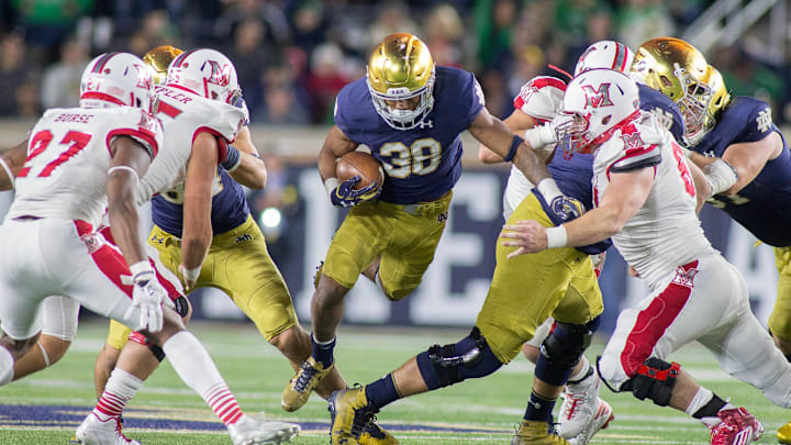 Sep 30, 2017; South Bend, IN, USA; Notre Dame Fighting Irish running back Deon McIntosh (38) runs the ball in the second half of the game against the Miami (Oh) Redhawks at Notre Dame Stadium.