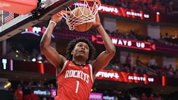 Apr 30, 2025; Houston, Texas, USA; Houston Rockets forward Amen Thompson (1) dunks against the Golden State Warriors in the fourth quarter during game five of the first round of the 2025 NBA Playoffs at Toyota Center.