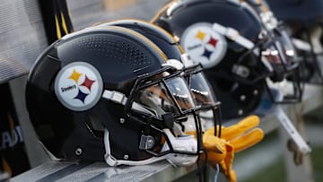 Aug 9, 2024; Pittsburgh, Pennsylvania, USA;  Pittsburgh Steelers helmets on the bench during the game against the Houston Texans during the first quarter at Acrisure Stadium. Mandatory Credit: Charles LeClaire-Imagn Images