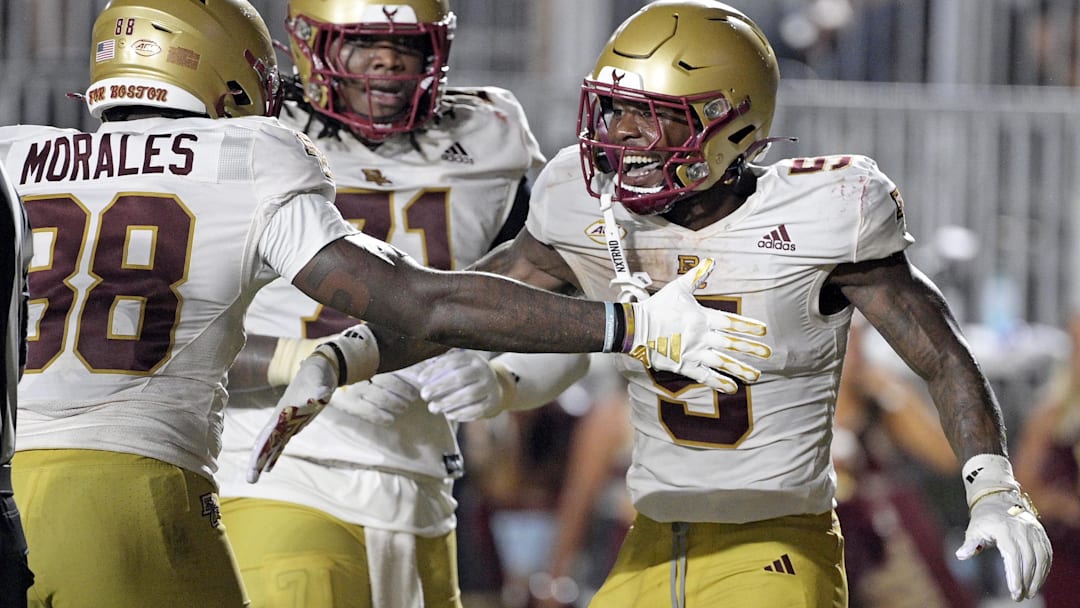 Sep 2, 2024; Tallahassee, Florida, USA; Boston College Eagles running back Kye Robichaux (5) celebrates a touchdown during the second half against the Florida State Seminoles at Doak S. Campbell Stadium. Mandatory Credit: Melina Myers-Imagn Images