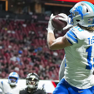 Detroit Lions wide receiver Isaac TeSlaa (18) catches a touchdown pass behind Atlanta Falcons cornerback Dee Alford (20) during the second quarter at Mercedes-Benz Stadium. 