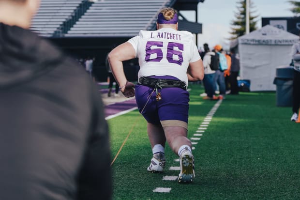 Landen Hatchett does resistance exercises while rehabbing his injured knee. 