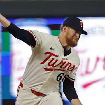 Sep 13, 2025; Minneapolis, Minnesota, USA; in his major league debut Minnesota Twins relief pitcher Cody Lawyerson (66) throws to the Arizona Diamondbacks in the seventh inning at Target Field. Mandatory Credit: Bruce Kluckhohn-Imagn Images