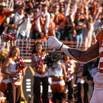 Texas Longhorns running back Jaydon Blue celebrates a touchdown during the game against Clemson in the first round of the College Football Playoffs