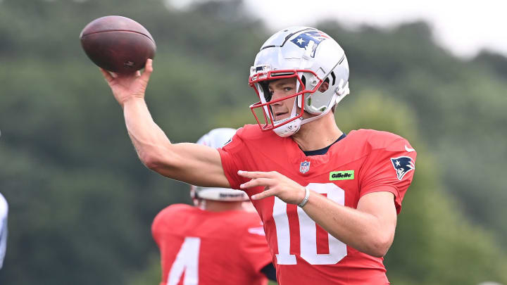 Aug 03, 2024; Foxborough, MA, USA; New England Patriots quarterback Drake Maye (10) throws a pass during training camp at Gillette Stadium. Mandatory Credit: Eric Canha-USA TODAY Sports