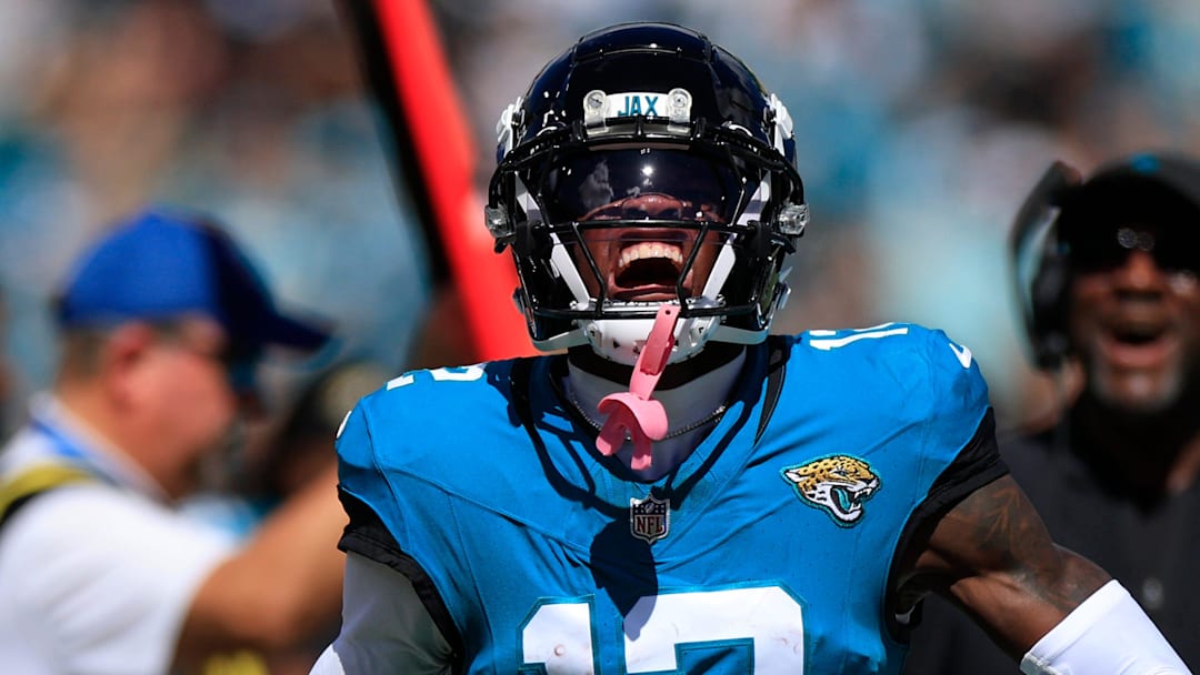 Jacksonville Jaguars wide receiver Travis Hunter (12) reacts to his carry during the first quarter of an NFL football matchup, Sunday, Oct. 12, 2025, at EverBank Stadium in Jacksonville, Fla. 