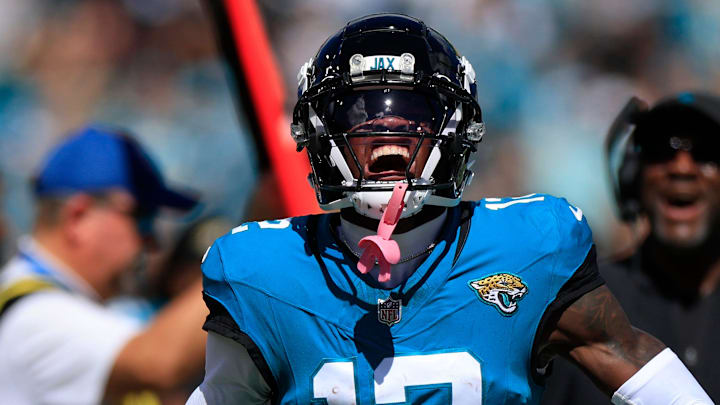 Jacksonville Jaguars wide receiver Travis Hunter (12) reacts to his carry during the first quarter of an NFL football matchup, Sunday, Oct. 12, 2025, at EverBank Stadium in Jacksonville, Fla. 