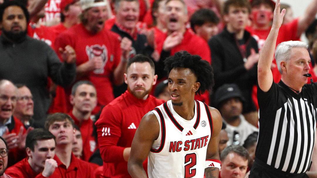 Feb 17, 2026; Raleigh, North Carolina, USA;  NC State Wolfpack guard Paul McNeil Jr. (2) reacts after scoring a basket against the North Carolina Tar Heels during the second half at Lenovo Center. Mandatory Credit: Zachary Taft-Imagn Images