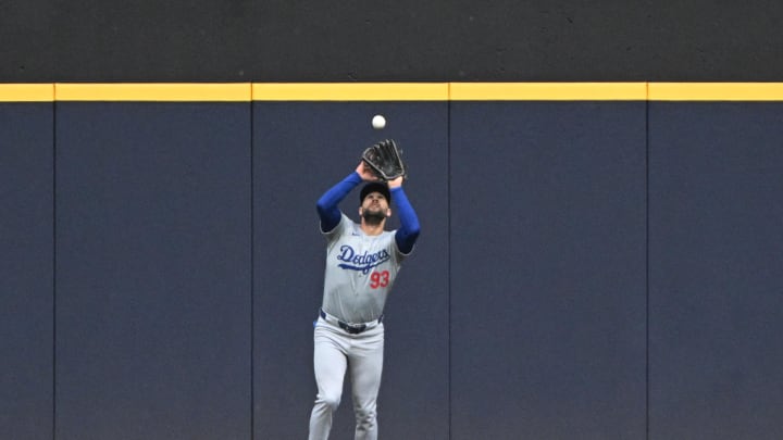 Los Angeles Dodgers outfielder Kevin Kiermaier (93) catches a fly ball in the second inning against the Milwaukee Brewers at American Family Field on Aug 12.