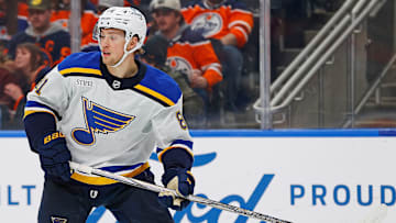 St. Louis Blues forward Dylan Holloway (81) look for a pass against the Edmonton Oilers