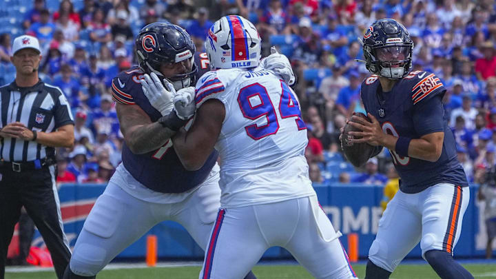 Aug 10, 2024; Orchard Park, New York, USA; Chicago Bears guard Matt Pryor (79) blocks Buffalo Bills defensive end Dawuane Smoot (94) during the first half at Highmark Stadium. 