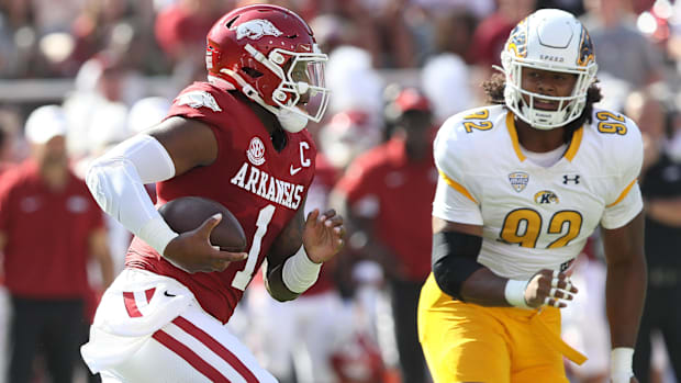 Arkansas quarterback KJ Jefferson runs against Kent State.