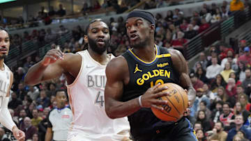 Feb 8, 2025; Chicago, Illinois, USA; Chicago Bulls forward Patrick Williams (44) defends Golden State Warriors forward Jimmy Butler (10) during the first half at United Center. Mandatory Credit: David Banks-Imagn Images