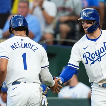 Aug 7, 2024; Kansas City, Missouri, USA; Kansas City Royals left fielder MJ Melendez (1) is congratulated by shortstop Bobby Witt Jr. (7) after scoring a run during the second inning against the Boston Red Sox at Kauffman Stadium. Mandatory Credit: Jay Biggerstaff-USA TODAY Sports