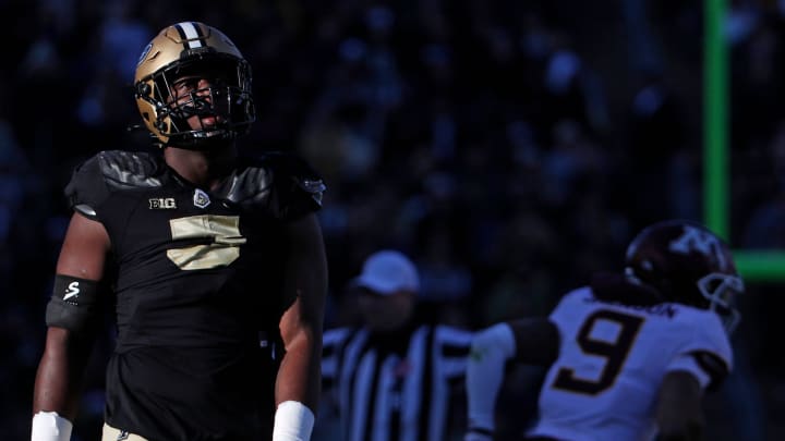 Purdue Boilermakers linebacker Nic Scourton (5) watches a replay on the scoreboard during the NCAA football game against the Minnesota Golden Gophers, Saturday, Nov. 11, 2023, at Ross-Ade Stadium in West Lafayette, Ind. Purdue Boilermakers won 49-30.