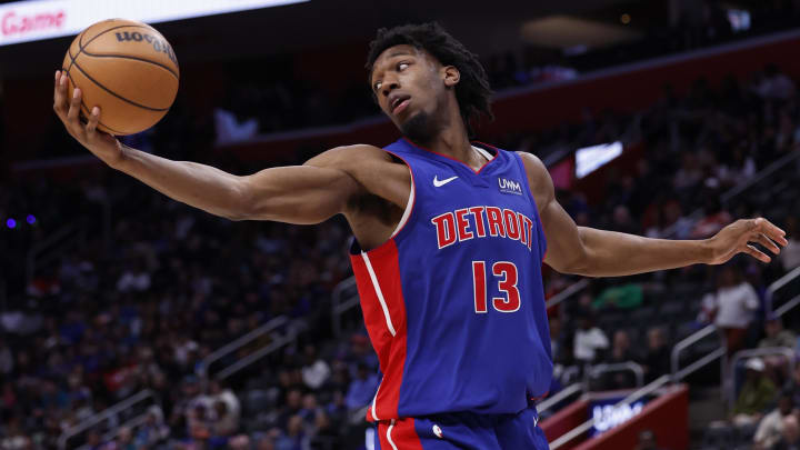 Apr 11, 2024; Detroit, Michigan, USA;  Detroit Pistons center James Wiseman (13) grabs the rebound in the second half against the Chicago Bulls at Little Caesars Arena. Mandatory Credit: Rick Osentoski-USA TODAY Sports